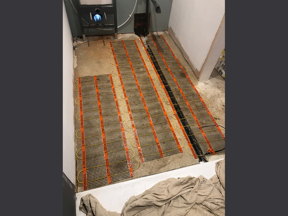 Electric underfloor heating by Craig Garner Electrical Ltd. Surrey